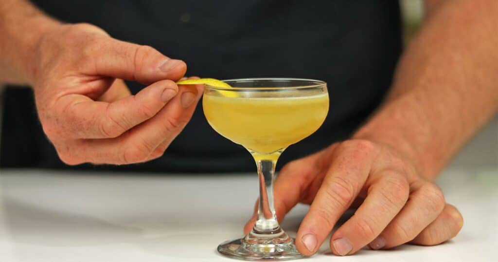 Add the finishing touches with garnishes and appealingly present your drink.